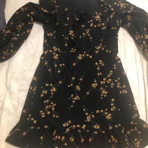 Black fitted dress with floral print